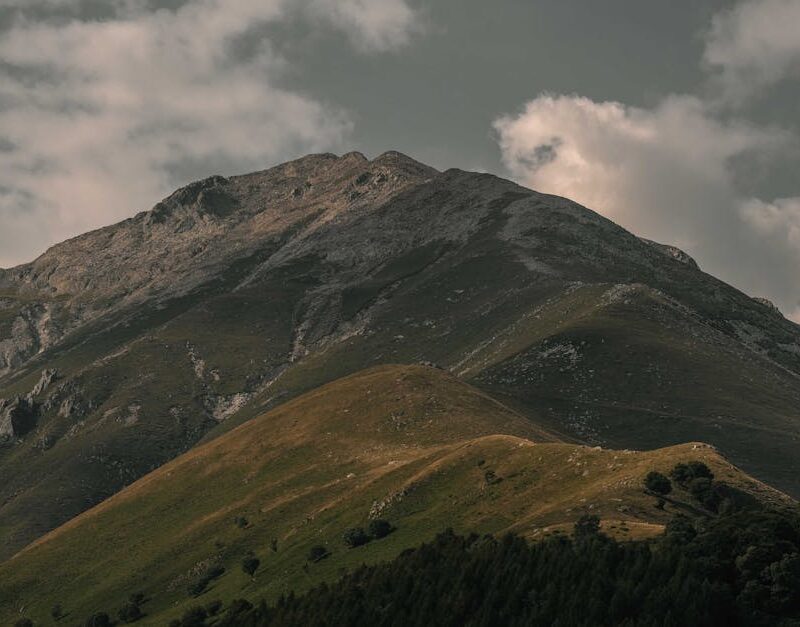 Mountain Landscapes - A stunning view of a majestic rocky mountain wit #18685949