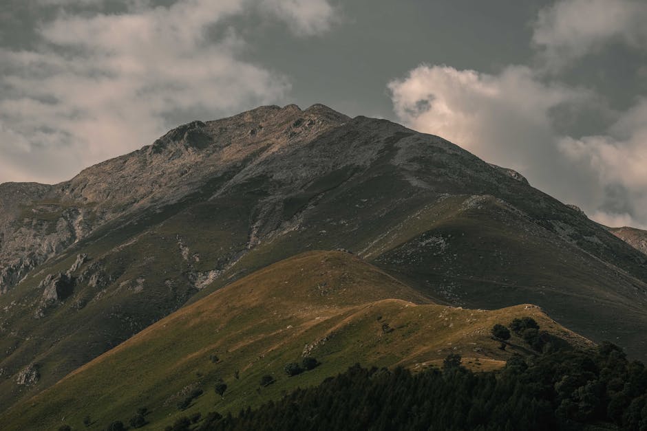 Mountain Landscapes - A stunning view of a majestic rocky mountain wit #18685949