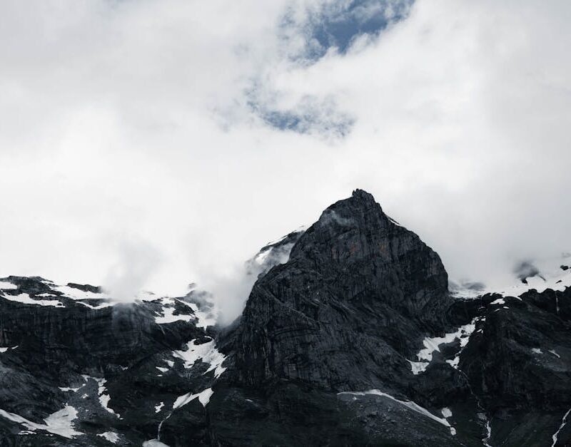 Mountain Landscapes - Stunning view of rugged mountain peaks and cloud #26382509