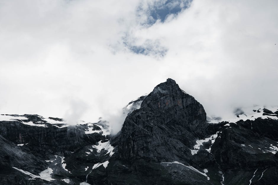 Mountain Landscapes - Stunning view of rugged mountain peaks and cloud #26382509