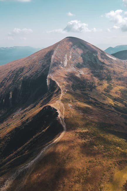 Mountain Landscapes - Breathtaking aerial view of a majestic mountain #30894681